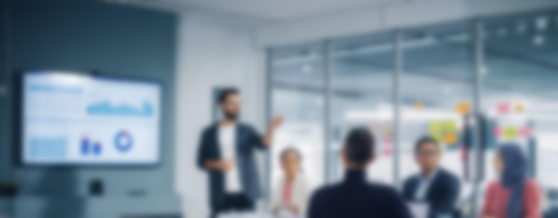 man speaking in a meeting room